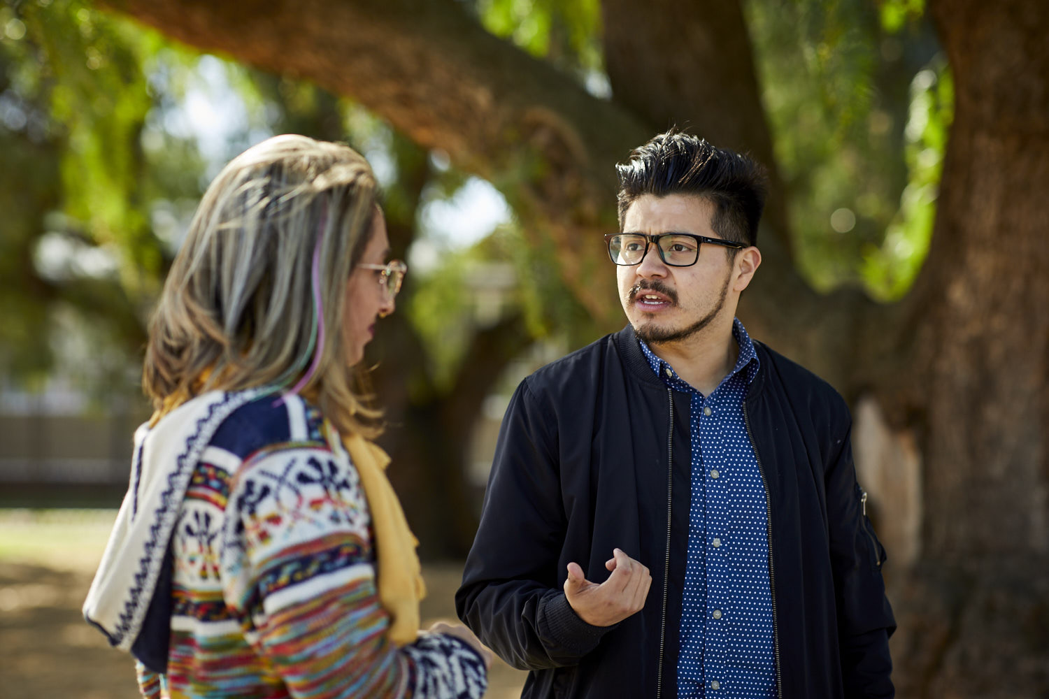 Two adults engaged in conversation